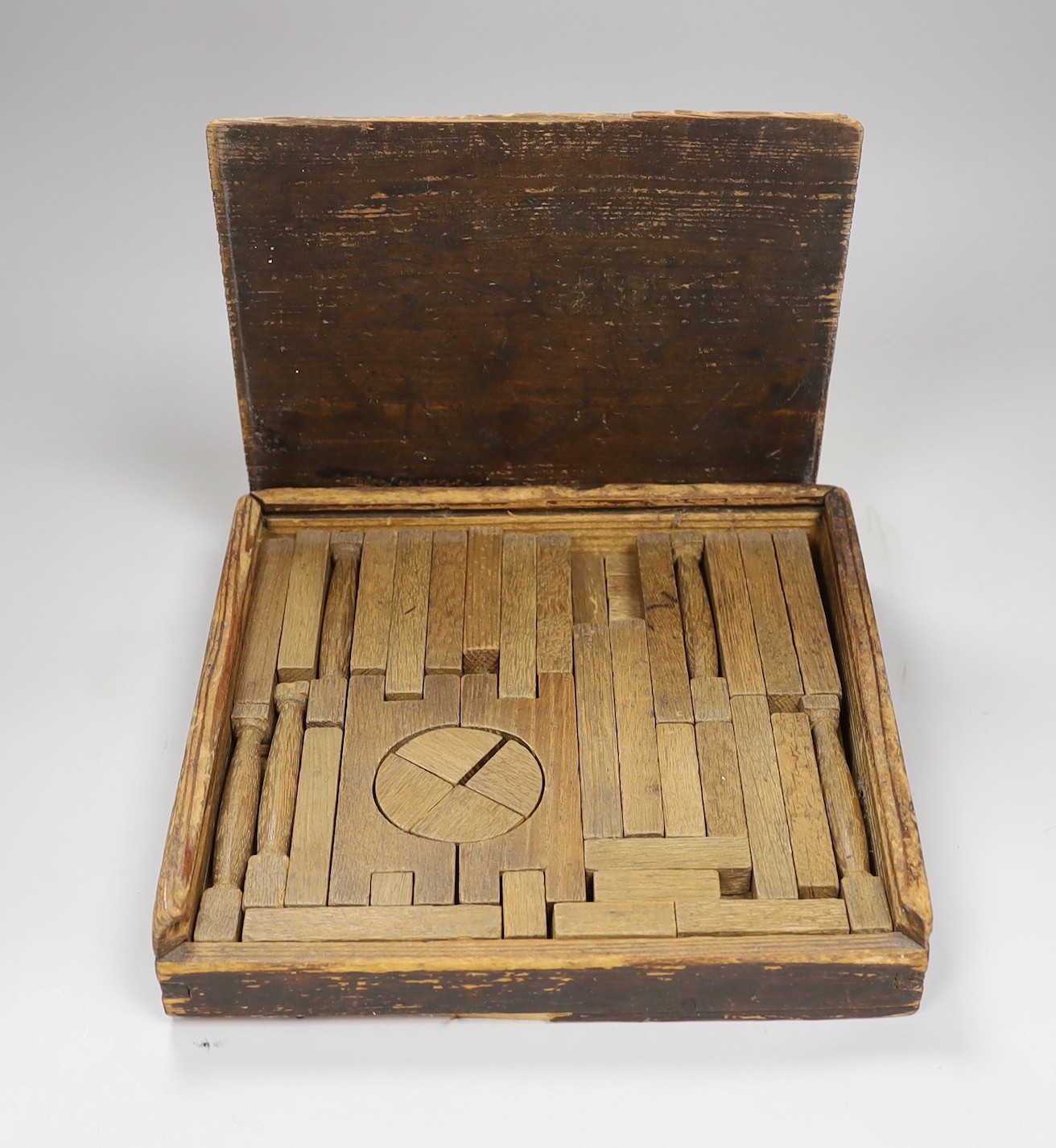 An early 20th century turned wood architectural building set